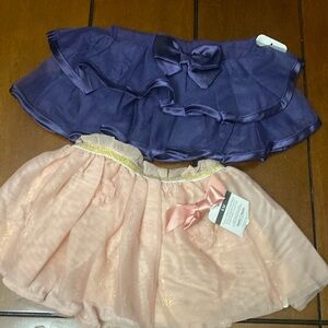 Baby girl skirts pink and purple 9 M. NWT